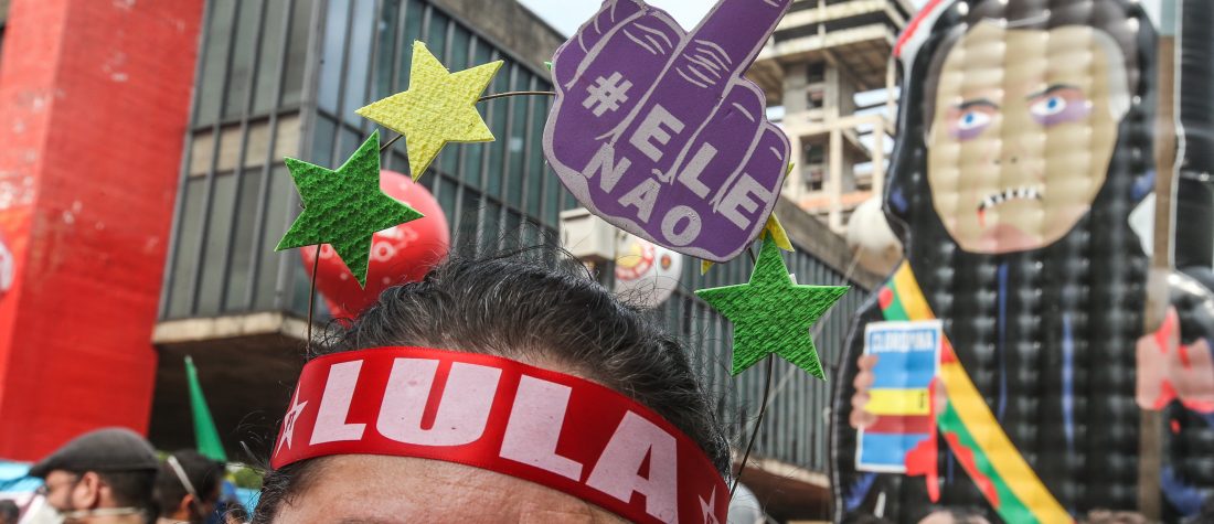 SAO PAULO, BRAZIL - OCTOBER 02: A demonstrator wears a headband in support of Lula during a protest against Brazilian President Jair Bolsonaro at Paulista avenue on October 02, 2021 in Sao Paulo, Brazil. Demonstrations against President of Brazil Jair Bolsonaro take place today in hundreds of cities as Bolsonaro faces a probe over his response to the pandemic. Among the demonstrators demands, they include impeachment for Bolsonaro, increase of emergency economic aid, end of violence against black and indigenous population. (Photo by Alexandre Schneider/Getty Images)