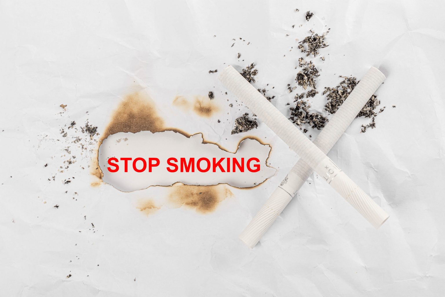 Photo: Stop smoking background with cigarettes and ash by Marco Verch under Creative Commons 2.0