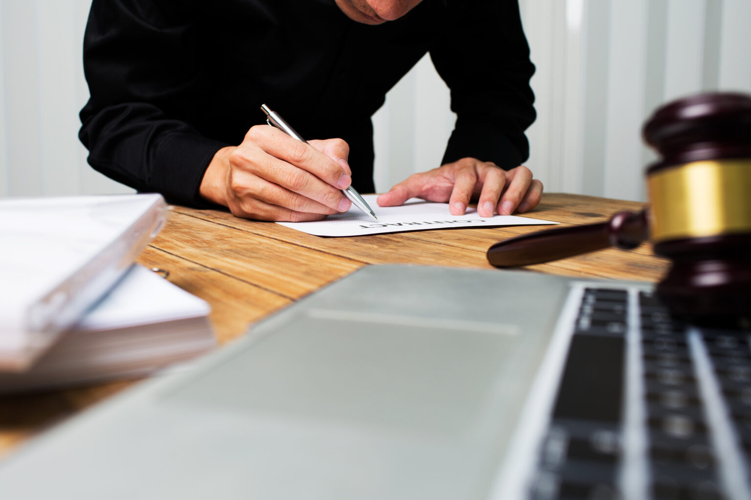 Young,Lawyer,Working,Hard,Alone,In,His,Office.