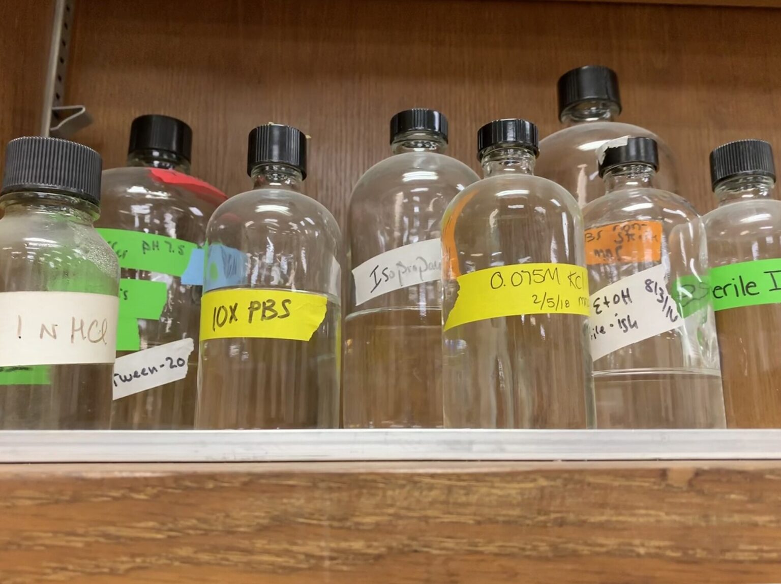 Shelf_of_Labeled_Bottles
