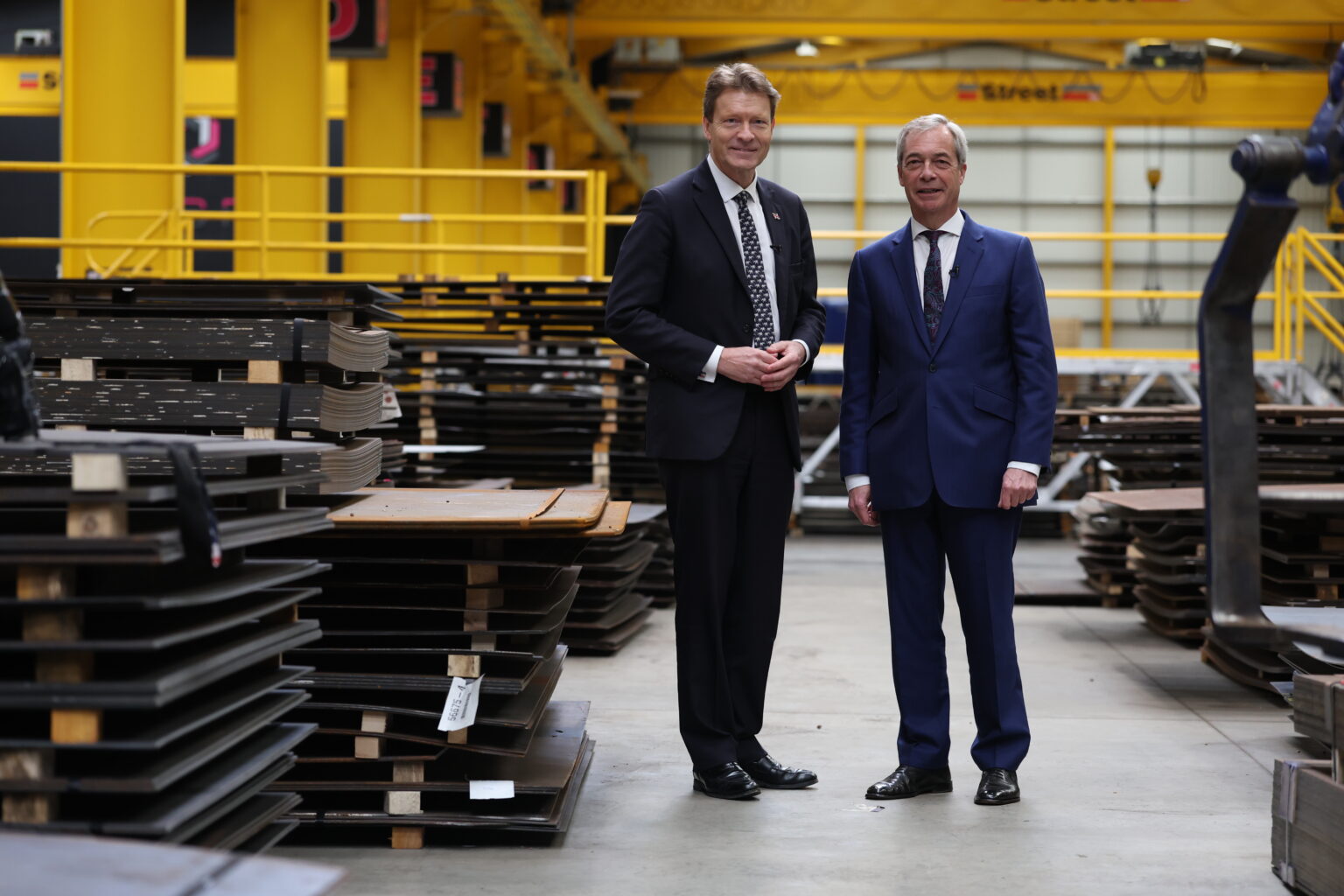 Richard Tice and Nigel Farage at the USP Steel plant in Dudley, West Midlands. Photo by Ryan Jenkinson/Getty Images)