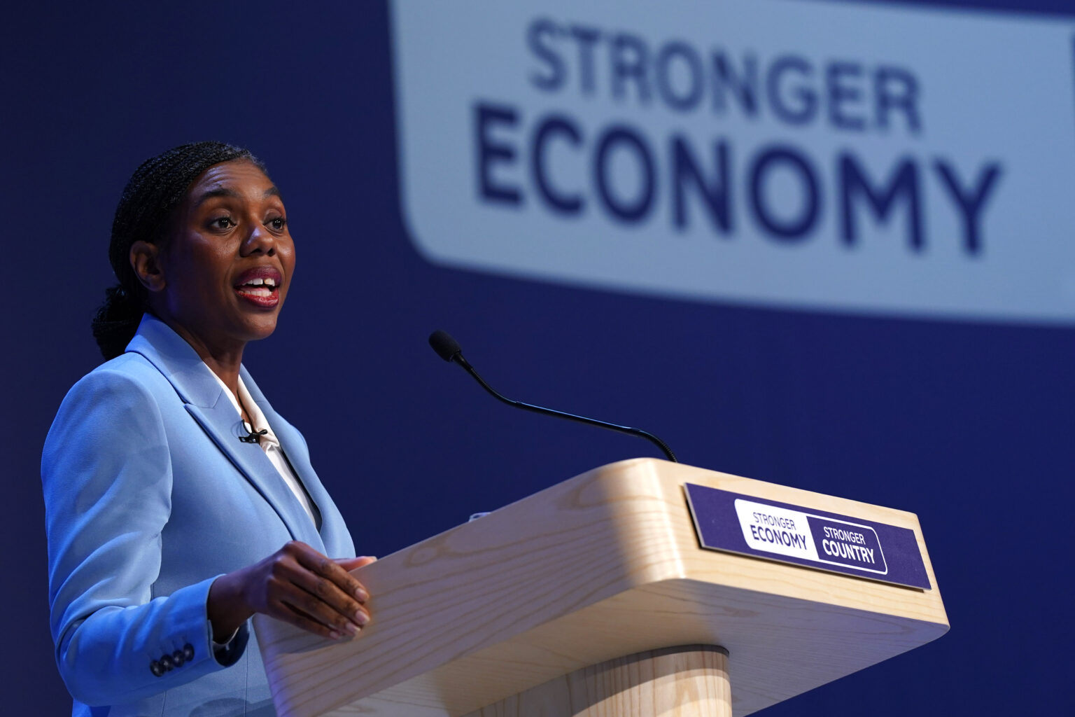 Tory leader Kemi Badenoch talks to party delegates in Birmingham on the opening day of conference 